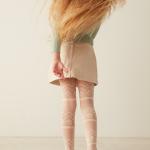 with long hair and white pantyhose