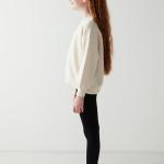 kisds with white sweat black leggings